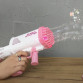 Пістолет з мильними бульбашками Бабл бластер WToys рожевий акум 3,7 V кольорове підсвічування 32 отвори мильний розчин 27*8*20см (49076)