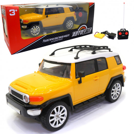 Игрушечная машинка на радиоуправлении АвтоСвіт «Toyota FJ Cruiser» джип желтый, свет, звук 30*12*13 см (AS-2201)